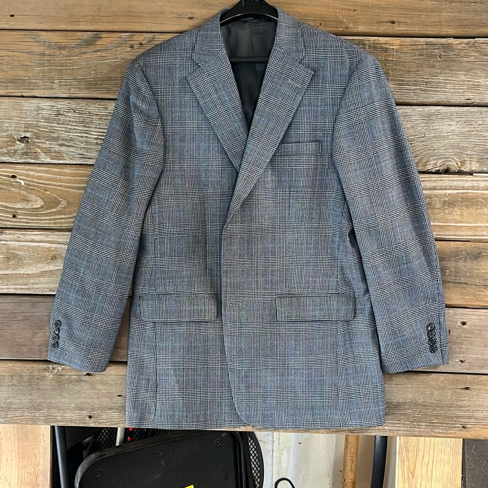 Tailored black and grey sport coat. Dry cleaned and very comfortable.